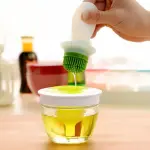 فرشاة توزيع الزيت الذكية 2 في 1
